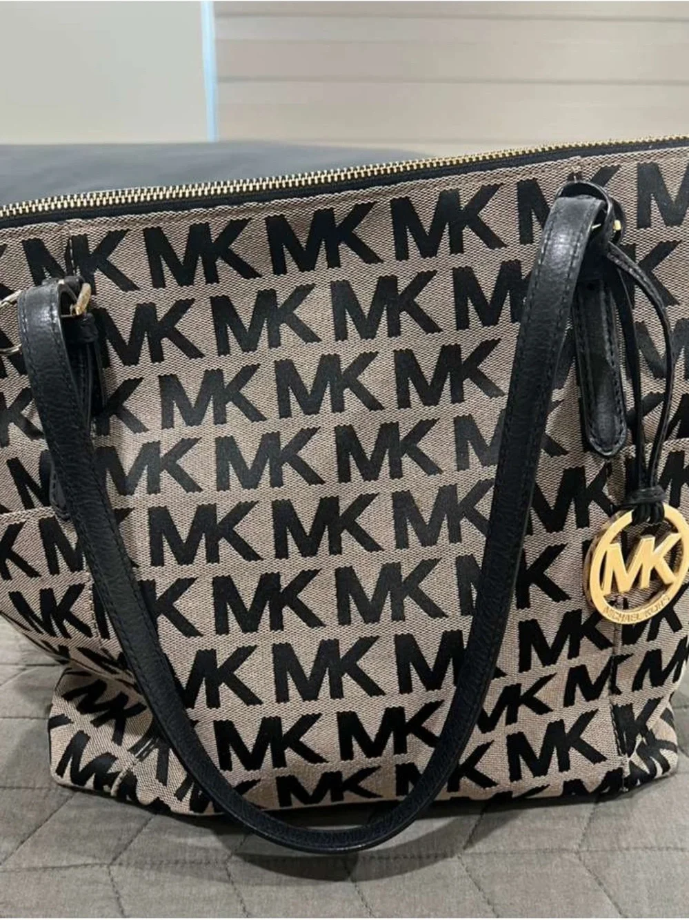 Michael Kors Beige Canvas Tote with Black MK Logo and Gold Charm